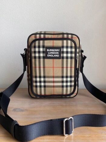 Bolso bandolera de tela estampada marrón con franjas